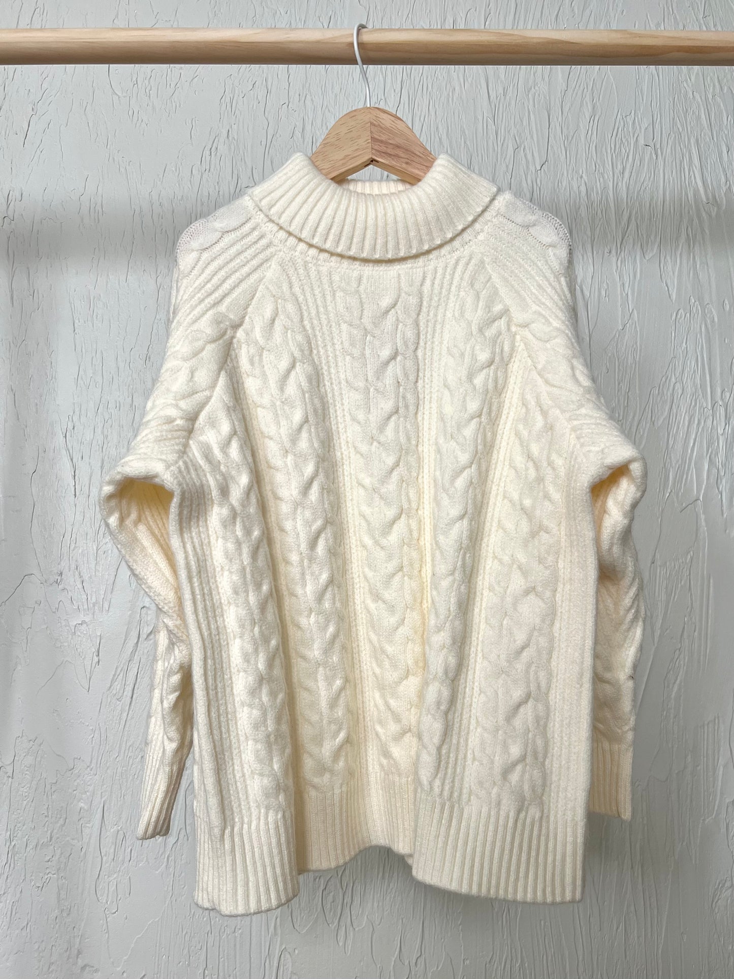 Pull col roulé